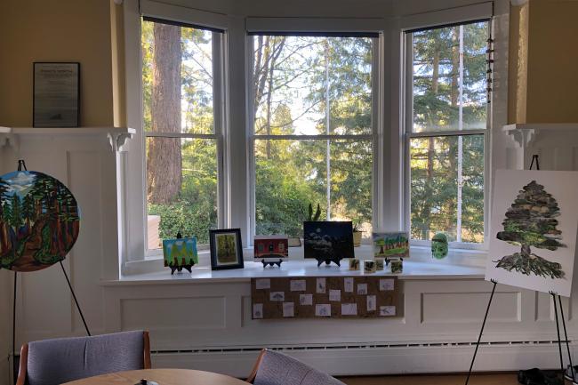 art canvases in front of picture window